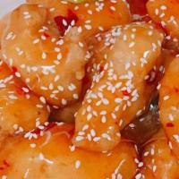 Sesame Chicken · Hot. Breaded chicken with a side of mild sweet glaze with sesame on top.