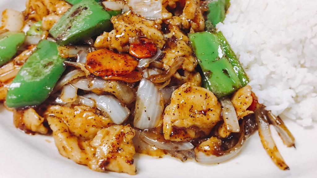 Black Pepper Chicken · Hot. White meat chicken, onions, carrots and green peppers in spicy black pepper sauce.