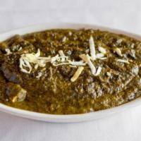 Saag Paneer · Cheese cubes and fresh spinach cooked with cream, fresh herbs, and spices.