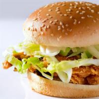 Crispy Chicken Burger · Crispy chicken burger with fresh lettuce, corn, pickles, mayo and ranch. Comes with fries.