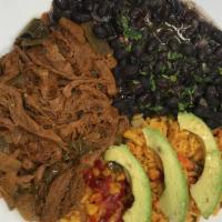 Shredded Special. · Tasty paella rice, black beans, avocado and choice of shredded chicken or beef.
