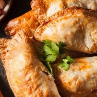 (11) 3 Empanada + Side · 3 Empanada Combo and your choice of side and sauce. . .Beef . .Chicken . .Veggies. .Cheese