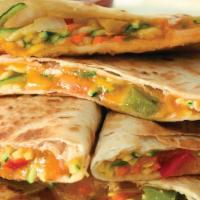 Cheese Quesadilla · Flour tortilla with cheddar/mozzarella cheese mix, served with a side of salsa and sour cream.