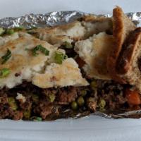 Shepherd'S Pie · Family recipe of ground beef, peas, carrots, and onions topped with mashed potatoes - served...