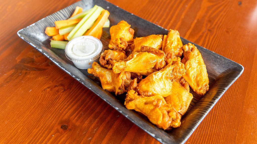 Chicken Wings · A dozen wings have done your way. Mild, hot, ghost (caution: extremely hot), BBQ, teriyaki, sweet chili, mango habanero or garlic Parmesan.