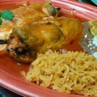 Chiles Rellenos · Two Poblano peppers battered in egg stuffed with your choice of chicken, steak or cheese.
