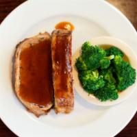 Meatloaf · Golden Saddle Favorite! A thick slice of our homemade meatloaf.