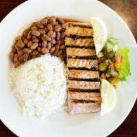 Grilled Salmon · Atlantic salmon with our seasoned with our special blend and grilled to perfection.