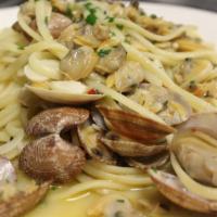 Linguine Alle Vongole · Baby sea clams, garlic, parsley, crushed red pepper in a white wine sauce.