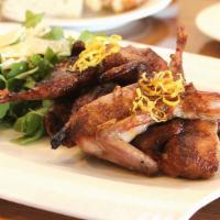 Chargrilled Quail · Served with arugula topped with a fresh Sicilian citrus drizzle and shaved parmigiano.