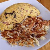 Apple Date Omelette · A fluffy fresh cracked omelette loaded with. granny apples, ham, bacon, cream cheese. and sw...