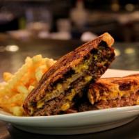 Patty Melt · Prime grilled hamburger patty with American cheese and grilled red onions on grilled rye.