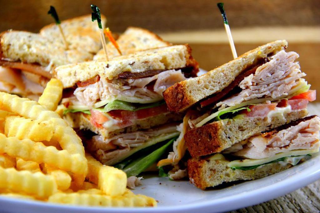 Turkey Blt Club · Three slices of toasted wheat with all-natural turkey, bacon, tomatoes, Jack cheese, lettuce and mayonnaise. It's a triple-decker!