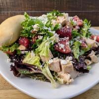 Chicken Strawberry Salad · Baby greens, grilled chicken, strawberries, goat cheese, red onions, and candied pecans. (Wi...