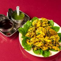 Palak Pakora · Fried chick peas patty made with spinach and spices.