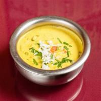 Vegetable Coconut Curry · Mix vegetable cooked with coconut spiced curry. Vegetarian.