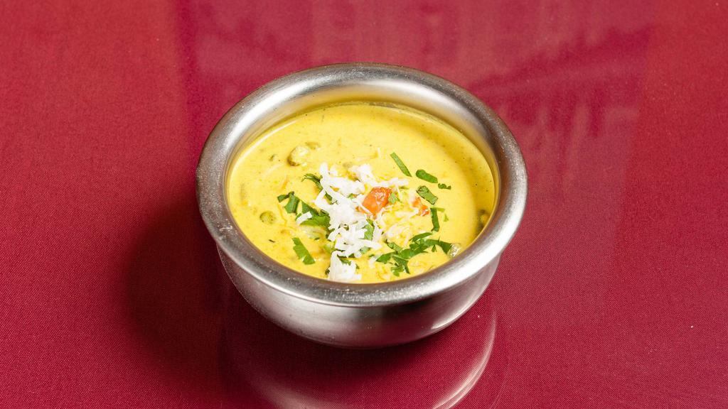 Vegetable Coconut Curry · Mix vegetable cooked with coconut spiced curry. Vegetarian.