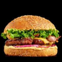 Steak Burger · Delicious juicy steak patty with house toppings on a buttery bun.