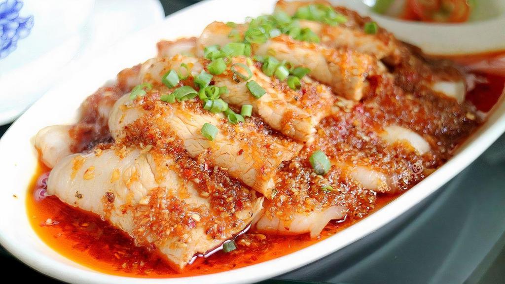 Sliced Pork W. Garlic Sauce 蒜泥白肉 · Tender slices of pork belly seasoned with scallion in sweet, spicy garlic sauce