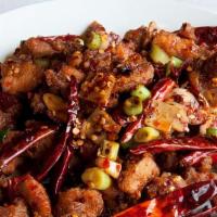 Chef'S Special Dry Chili Chicken · Fried crispy chicken chunks wok-tossed with dried red pepper and scallions