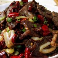 Hunan Beef · Sliced tender beef wok-tossed with broccoli, mushrooms, peapods, cabbage, carrots, zucchini,...
