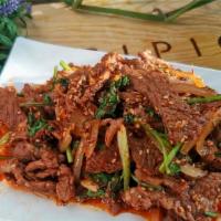 Cumin Beef 孜然牛肉 · Shredded beef stir-fried with shallots and cilantro