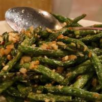 Sautéed String Beans With Dried Chili · Quick fried fresh green beans wok-tossed with dry red pepper
