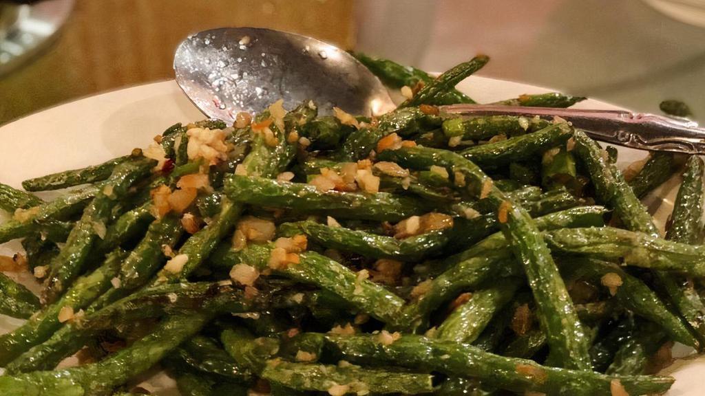 Sautéed String Beans With Dried Chili · Quick fried fresh green beans wok-tossed with dry red pepper