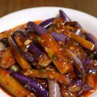 Eggplants With Garlic Sauce 鱼香茄子 · Quick fried eggplants braised with red and green peppers in sweet & sour spicy sauce