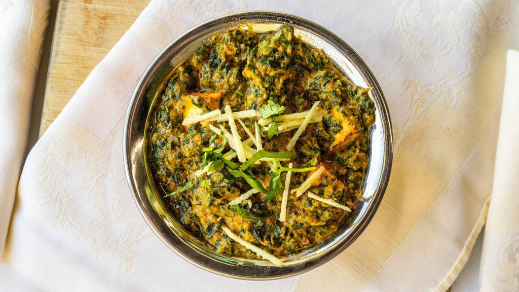 Palak Paneer · Spinach and home made cheese cubes.