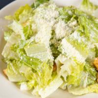 Caesar Salad · Hearts Of Romaine, Garlic Crouton, Parmesan.