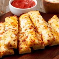 Garlic Breadsticks · A blend of cheeses melted over our delicious dough and brushed with garlic butter sauce