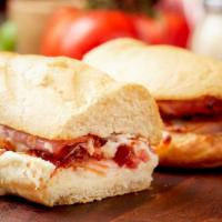Club Sandwich · Turkey, ham, bacon with mozzarella cheese and our secret sauce.