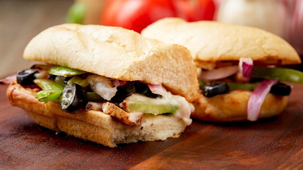 Veggie Sandwich · Green Peppers, Onions, Black Olives, and Fresh Mushrooms with Mozzarella Cheese and our secret sauce