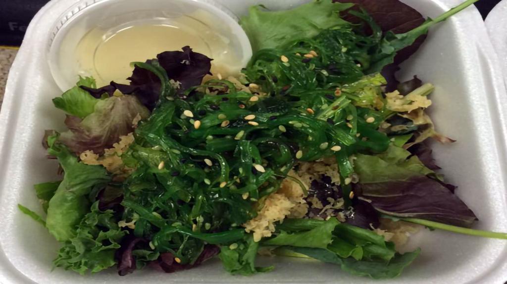 Wakame Salad · Seaweed salad with a savory dressing.