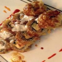 Big Daddy Roll · Tempura fried roll with crab mix recipe, cream cheese, cucumber topped with sweet sauce & 4 ...