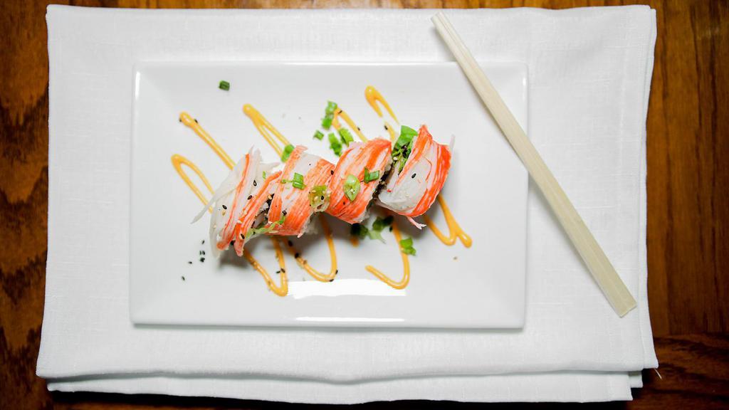 All About Crab Roll · Soft shell crab, crab recipe mix, spring mix, topped with crabstick, honey lemon sauce, tobiko.
