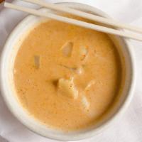 Masamon Curry · Masamon curry sauce with your choice of meat, coconut milk, carrots, onions, potatoes, peanu...