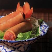 Spring Rolls (2) · A crispy spring roll stuffed with chicken, bamboo shoots, carrots, and bean threat noodles, ...