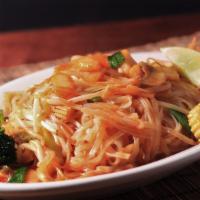 Pad Thai · Thai style stir fried rice noodles with your choice of meat, egg, beansprouts, and green oni...