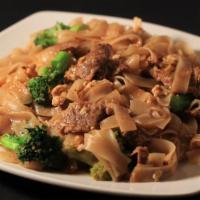 Pad See Ewe · Stir fried rice noodle with your choice of meat with egg, broccoli in dark soy sauce.