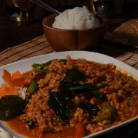 Pad Bai Kaprao · Spicy. Minced chicken stir fried with peppers, basil in chili garlic sauce.