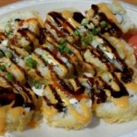 Fusion Roll · Crab, tempura shrimp, cream cheese, avocado, scallion, masago, hot sauce, spicy mayo, eel sa...