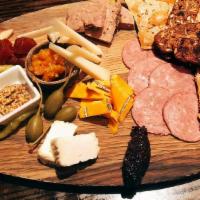 Cheese & Charcuterie Plate · Chef's choice of three meats, three cheeses,  jams, mustards, pickles and crackers. Serves 2-4