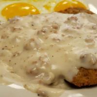 Country Fried Steak · Breaded country fried steak topped with our house made gravy and served with two eggs.