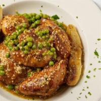 Chicken Vesuvio · Half chicken sautéed in olive oil, garlic, white wine, peas and potatoes.