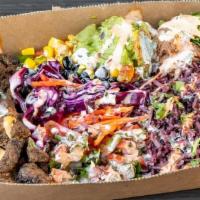 Michos Rice Box · Served on a bed of purple rice. Pick your proteins, toppings, and sauces