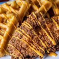 Chicken & Waffle Sandwich · fried chicken breast, belgian waffle, sriracha aioli, maple honey butter, side of waffle fries