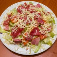 Antipasto Salad · Lettuce, salami, ham, cheese, peppers, olives, and tomatoes