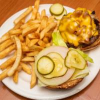 The Works Burger · Half pound burger with grilled bacon, onions and mushrooms topped with Swiss and American ch...